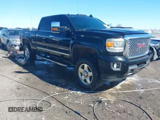2015 GMC Sierra 2500HD available WiFi Denali with VIN 1GT120E86FF567722, listed as a IAAI auction lot 41603473 with 176,312 mi miles. Bid and sale history available at carsss.com. Image 1.