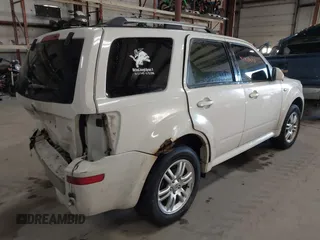 2009 Mercury Mariner Premier with VIN 4M2CU97729KJ00086, listed as a IAAI auction lot 41418490 with 167,486 mi miles. Bid and sale history available at carsss.com. Image 4.