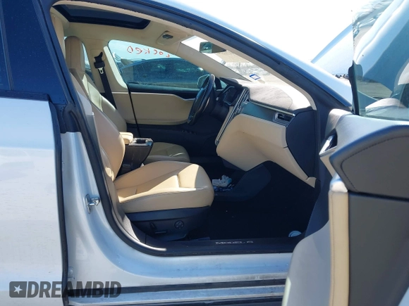 2015 Tesla Model S 85D with VIN 5YJSA1H48FF082038, listed as a IAAI auction lot 41712242 with 58,297 mi miles. Bid and sale history available at carsss.com. Image 5.