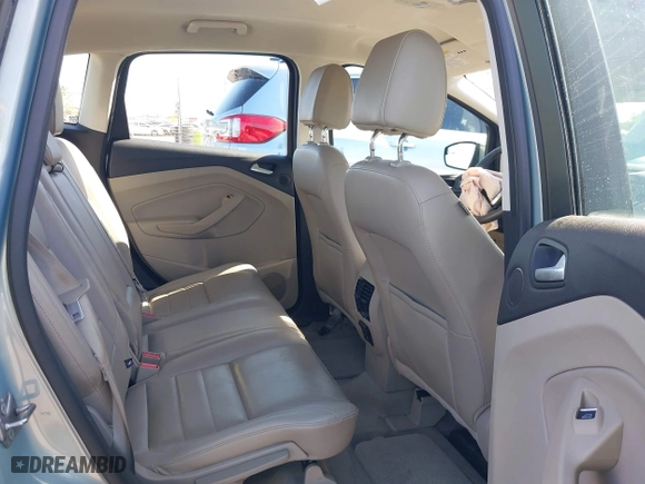 2013 Ford C-Max Hybrid SEL with VIN 1FADP5BUXDL521814, listed as a IAAI auction lot 41944352 with 130,999 mi miles. Bid and sale history available at carsss.com. Image 8.