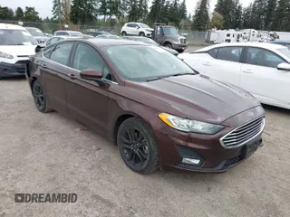 2019 Ford Fusion SE with VIN 3FA6P0HD0KR136232, listed as a IAAI auction lot 42015102 with 66,472 mi miles. Bid and sale history available at carsss.com. Image 1.
