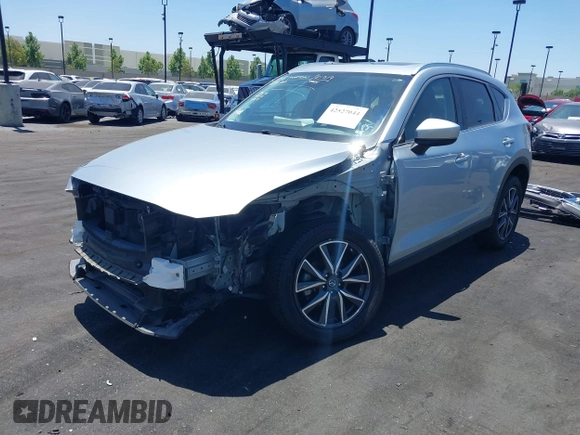 2018 Mazda CX-5 Grand Touring with VIN JM3KFBDM3J0343782, listed as a IAAI auction lot 42527044 with 60,180 mi miles and . Bid and sale history available at DreamBid. Image 18.