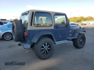 2001 Jeep Wrangler Sport with VIN 1J4FA49S21P346900, listed as a Copart auction lot 75439604 with 128,824 mi miles and Clean Title. Bid and sale history available at carsss.com. Image 3.