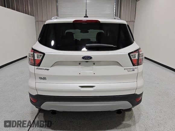 2018 Ford Escape Titanium with VIN 1FMCU9J90JUC67390, listed as a Copart auction lot 64271865 with 79,921 mi miles and Clean title. Bid and sale history available at DreamBid. Image 6.