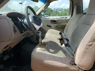 2004 Ford F-150 XL с VIN 2FTRF17214CA15575, выставлен на аукционе Copart как лот 58178125 с пробегом 184 008 миль миль и Списание • Salvage title. История ставок и продаж доступна на DreamBid. Изображение 7.