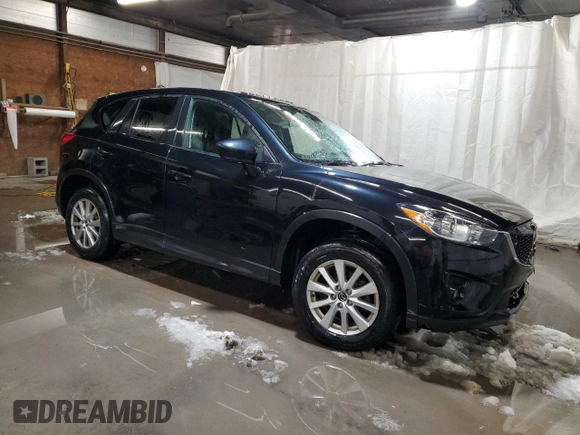 2015 Mazda CX-5 Touring with VIN JM3KE4CY1F0458911, listed as a Copart auction lot 87666255 with 0 mi miles and Salvage Title. Bid and sale history available at carsss.com. Image 4.