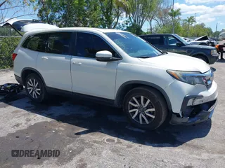 2019 Honda Pilot EX-L with VIN 5FNYF5H53KB012596, listed as a IAAI auction lot 42268975 with 69,667 mi miles and . Bid and sale history available at DreamBid. Image 1.