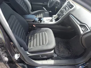 2015 Ford Fusion SE with VIN 1FA6P0H77F5122055, listed as a IAAI auction lot 42198056 with 151,029 mi miles and . Bid and sale history available at DreamBid. Image 5.