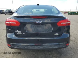 2018 Ford Focus SE with VIN 1FADP3FEXJL215912, listed as a Copart auction lot 50518385 with 100,080 mi miles and Salvage Title. Bid and sale history available at carsss.com. Image 6.