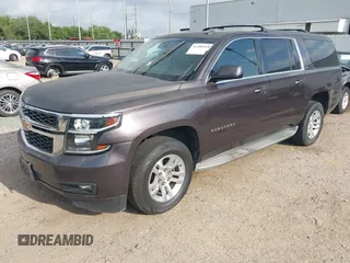 2015 Chevrolet Suburban LT with VIN 1GNSCJKCXFR175154, listed as a IAAI auction lot 42280418 with 227,373 mi miles and . Bid and sale history available at DreamBid. Image 2.