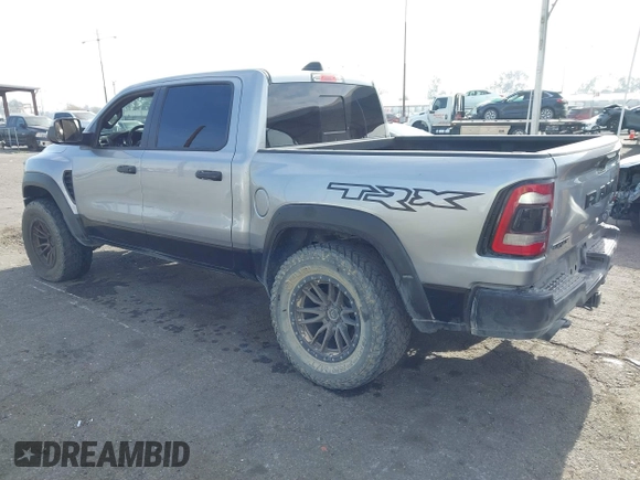 2021 Ram 1500 TRX with VIN 1C6SRFU92MN726050, listed as a IAAI auction lot 41175299 with 34,602 mi miles. Bid and sale history available at carsss.com. Image 3.