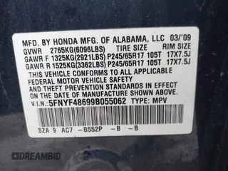 2009 Honda Pilot EX-L with VIN 5FNYF48699B055062, listed as a IAAI auction lot 41967409 with 300,781 mi miles and . Bid and sale history available at carsss.com. Image 9.