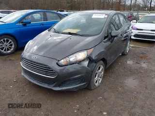 2016 Ford Fiesta SE with VIN 3FADP4BJ2GM196952, listed as a IAAI auction lot 41694838 with 121,192 mi miles and . Bid and sale history available at DreamBid. Image 6.