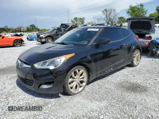 2013 Hyundai Veloster w/Gray Int z VIN KMHTC6AD0DU146529, wystawiony jako Copart lot #62612425 z przebiegiem 128 554 mil mil oraz Czysty tytuł • Clean title. Historia ofert i sprzedaży dostępna na DreamBid. Obrazek 1.