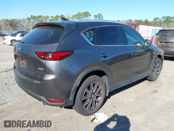 2018 Mazda CX-5 Grand Touring with VIN JM3KFADMXJ1402864, listed as a IAAI auction lot 41781188 with 1 mi miles. Bid and sale history available at carsss.com. Image 4.