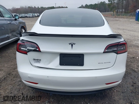 2021 Tesla Model 3 Long Range z VIN 5YJ3E1EB9MF014985, wystawiony jako IAAI lot #41672208 z przebiegiem 52 222 mil mil oraz . Historia ofert i sprzedaży dostępna na DreamBid. Obrazek 6.