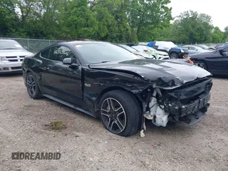 2018 Ford Mustang GT z VIN 1FA6P8CFXJ5120516, wystawiony jako IAAI lot #42367616 z przebiegiem 60 668 mil mil oraz . Historia ofert i sprzedaży dostępna na DreamBid. Obrazek 1.