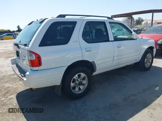 2001 Isuzu Rodeo S with VIN 4S2CK58W614332181, listed as a IAAI auction lot 42585130 with 196,497 mi miles and . Bid and sale history available at DreamBid. Image 4.