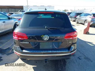 2016 Volkswagen Touareg Sport with VIN WVGEF9BP4GD012265, listed as a IAAI auction lot 41208383 with 69,205 mi miles and . Bid and sale history available at DreamBid. Image 16.