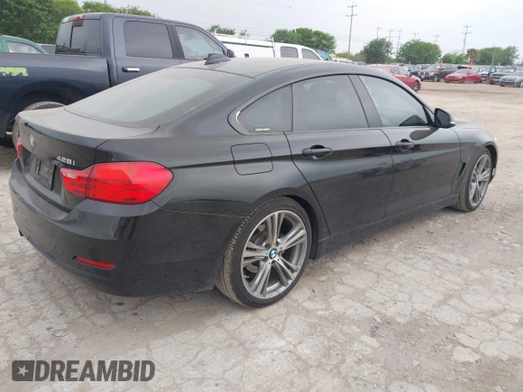 2016 BMW 4 Series 428i with VIN WBA4A9C51GG506512, listed as a IAAI auction lot 41940754 with 144,999 mi miles and . Bid and sale history available at DreamBid. Image 4.