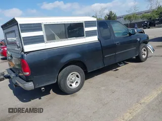 2002 Ford F-150 XL with VIN 1FTRX17L02NB79722, listed as a IAAI auction lot 41538404 with 202,050 mi miles. Bid and sale history available at carsss.com. Image 4.