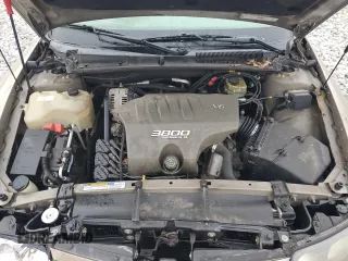 2001 Pontiac Bonneville SE z VIN 1G2HX54K414249469, wystawiony jako Copart lot #46934415 z przebiegiem 112 292 mil mil oraz Szkoda całkowita • Salvage title. Historia ofert i sprzedaży dostępna na DreamBid. Obrazek 12.