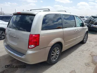 2014 Dodge Grand Caravan SXT with VIN 2C4RDGCG6ER466459, listed as a IAAI auction lot 41820907 with 105,404 mi miles and . Bid and sale history available at DreamBid. Image 4.