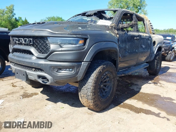 2022 Ram 1500 TRX with VIN 1C6SRFU99NN151639, listed as a IAAI auction lot 42145733 with Not provided miles and . Bid and sale history available at DreamBid. Image 2.
