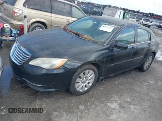 2012 Chrysler 200 LX with VIN 1C3CCBAB9CN214335, listed as a IAAI auction lot 42003721 with 225,632 mi miles and . Bid and sale history available at carsss.com. Image 2.