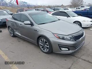 2014 Kia Optima SXL Turbo with VIN 5XXGR4A69EG312273, listed as a IAAI auction lot 41729863 with 107,660 mi miles and . Bid and sale history available at DreamBid. Image 1.