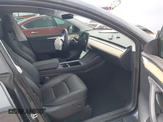 2023 Tesla Model Y Long Range with VIN 7SAYGDEE0PA036048, listed as a IAAI auction lot 41775845 with 41,291 mi miles. Bid and sale history available at carsss.com. Image 5.