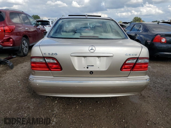 2002 Mercedes-Benz E-Class with VIN WDBJF82JX2X070380, listed as a Copart auction lot 68675974 with 88,274 mi miles and Salvage Title. Bid and sale history available at carsss.com. Image 6.
