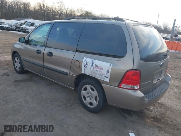 2005 Ford Freestar SE z VIN 2FMZA51645BA05742, wystawiony jako IAAI lot #41429194 z przebiegiem 145 415 mil mil oraz . Historia ofert i sprzedaży dostępna na DreamBid. Obrazek 3.