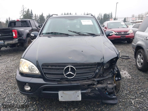 2002 Mercedes-Benz M-Class with VIN 4JGAB54E72A296354, listed as a IAAI auction lot 41277897 with 101,842 mi miles. Bid and sale history available at carsss.com. Image 12.