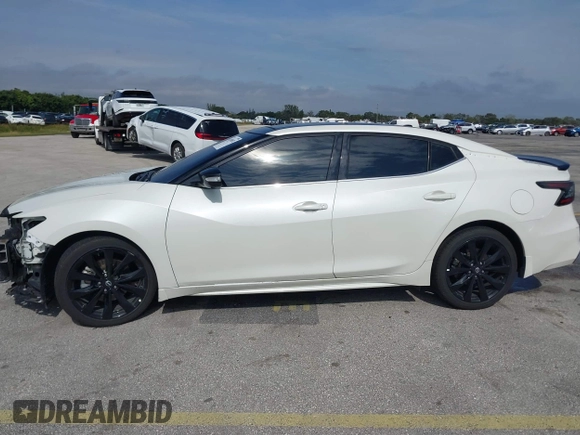 2023 Nissan Maxima SR with VIN 1N4AA6EV2PC505917, listed as a IAAI auction lot 41389852 with 26,018 mi miles and . Bid and sale history available at DreamBid. Image 14.