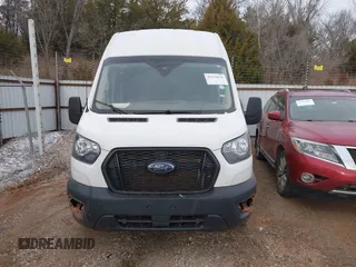 2023 Ford Transit Cargo with VIN 1FTBR2X8XPKB02099, listed as a IAAI auction lot 41576034 with 52,070 mi miles and . Bid and sale history available at DreamBid. Image 12.
