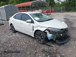 2018 Toyota Corolla L with VIN 5YFBURHE4JP797409, listed as a IAAI auction lot 42177400 with 243,983 mi miles and . Bid and sale history available at DreamBid. Image 1.
