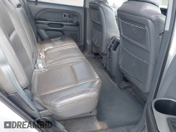 2003 Honda Pilot EX with VIN 2HKYF18603H504829, listed as a IAAI auction lot 42083247 with 247,429 mi miles and . Bid and sale history available at carsss.com. Image 8.