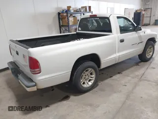 2001 Dodge Dakota with VIN 1B7FL26XX1S304511, listed as a IAAI auction lot 41246101 with 117,457 mi miles. Bid and sale history available at carsss.com. Image 4.