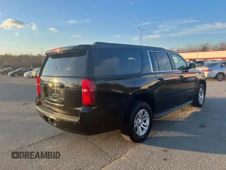 2015 Chevrolet Suburban with VIN 1GNSKHEC4FR25217, listed as a Copart auction lot 65346775 with 213,363 mi miles and Clean title. Bid and sale history available at DreamBid. Image 4.
