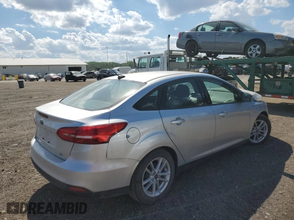 2017 Ford Focus SE z VIN 1FADP3F24HL308294, wystawiony jako Copart lot #56516265 z przebiegiem 80 431 mil mil oraz Szkoda całkowita • Salvage title. Historia ofert i sprzedaży dostępna na DreamBid. Obrazek 3.