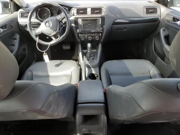 2017 Volkswagen Jetta SEL z VIN 3VWL17AJ4HM263303, wystawiony jako Copart lot #54363545 z przebiegiem 103 597 mil mil oraz Szkoda całkowita • Salvage title. Historia ofert i sprzedaży dostępna na DreamBid. Obrazek 8.