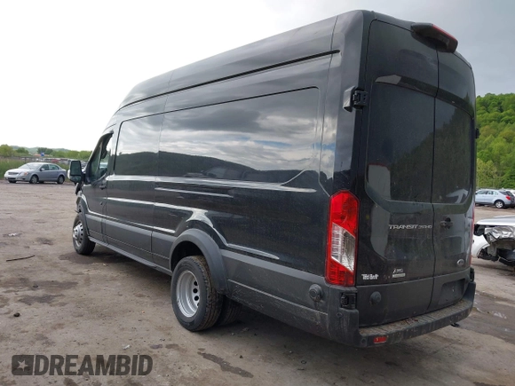 2022 Ford Transit Cargo z VIN 1FTBF4UG4NKA60882, wystawiony jako IAAI lot #42255992 z przebiegiem 2 977 mil mil oraz . Historia ofert i sprzedaży dostępna na DreamBid. Obrazek 3.