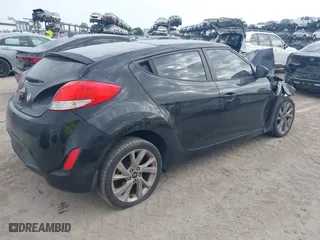 2016 Hyundai Veloster with VIN KMHTC6AD6GU251094, listed as a IAAI auction lot 41971550 with 97,744 mi miles. Bid and sale history available at carsss.com. Image 4.