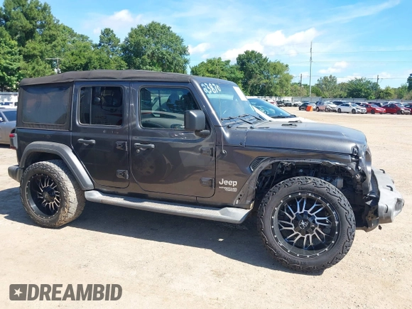 2018 Jeep Wrangler Unlimited Sport S с VIN 1C4HJXDN6JW277829, выставлен на аукционе IAAI как лот 42607187 с пробегом 107 461 миль миль и . История ставок и продаж доступна на DreamBid. Изображение 13.