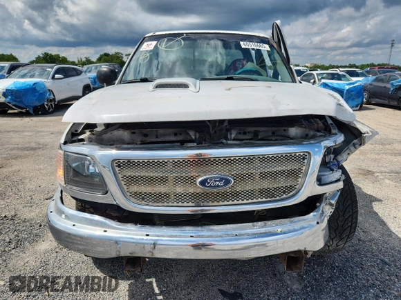 2001 Ford F-150 XLT with VIN 1FTRW07W71KE61878, listed as a Copart auction lot 60516665 with Not provided miles and Salvage title. Bid and sale history available at DreamBid. Image 5.