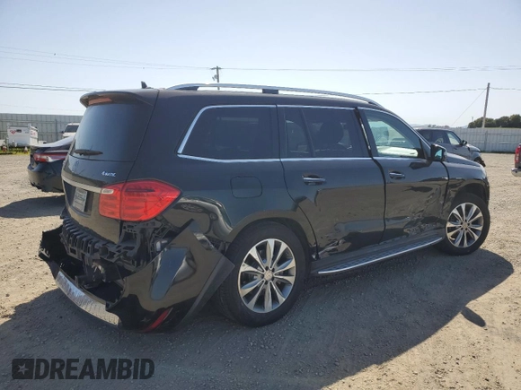 2014 Mercedes-Benz GL 450 z VIN 4JGDF7CE0EA426199, wystawiony jako Copart lot #52172115 z przebiegiem 114 749 mil mil oraz Szkoda całkowita • Salvage title. Historia ofert i sprzedaży dostępna na DreamBid. Obrazek 3.
