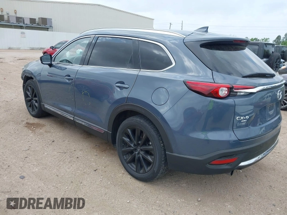 2023 Mazda CX-9 Carbon Edition with VIN JM3TCBDY6P0650808, listed as a IAAI auction lot 41965934 with 62,874 mi miles and . Bid and sale history available at carsss.com. Image 3.