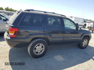 2004 Jeep Grand Cherokee Laredo with VIN 1J4GW48S84C182135, listed as a Copart auction lot 62224975 with 187,938 mi miles and Clean title. Bid and sale history available at DreamBid. Image 3.