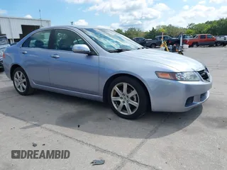 2004 Acura TSX w/Navigation with VIN JH4CL96944C045735, listed as a IAAI auction lot 42042197 with 197,900 mi miles. Bid and sale history available at carsss.com. Image 1.